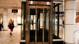 Epic Priceless amp Amazing inground hydraulic glass elevators  Montreal Trudeau Airport YUL [upl. by Aneehsor314]